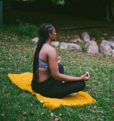 photo of woman doing meditation